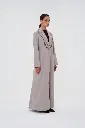Fashion model in a soft-gray studio-2.webp